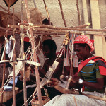 Weavers at Looms